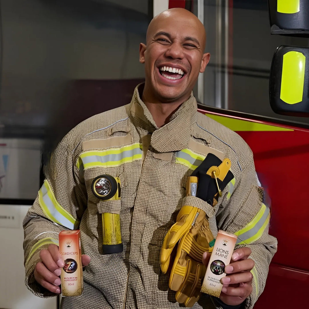 Firefighter holding Lions mane and Cordyceps