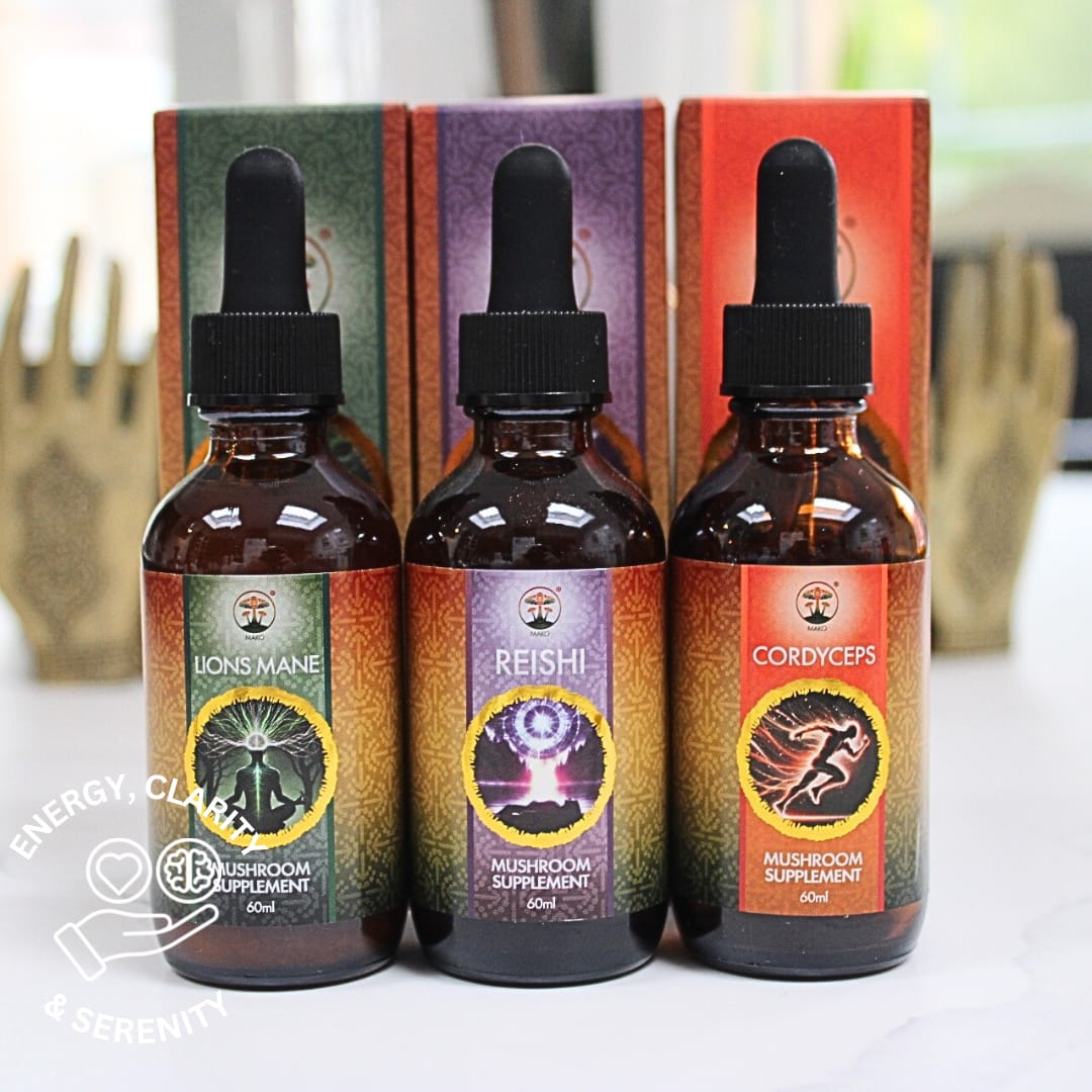 Three mushroom supplement bottles with colorful labels on a white surface. Lions mane, Cordyceps and Reishi
