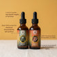 Two mushroom supplement bottles with labels on a textured surface and beige background. Lions mane and Cordyceps morning bundle