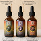 Three mushroom supplement bottles with labels on a beige background. Lions mane, Cordyceps and Reishi
