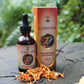 Mako's Cordyceps mushroom tincture in an amber glass bottle with dropper, box and natural Cordyceps on log front