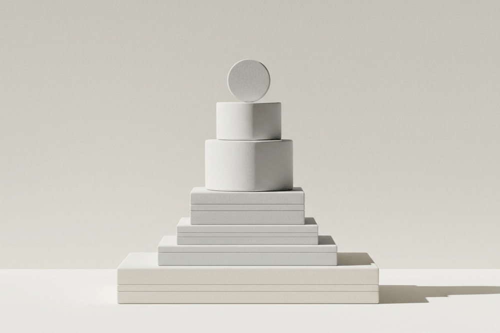 repetition implied (stacked objects, aligned forms)
